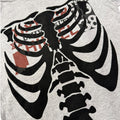 t shirt vintage sovrastampata con ossa college tg s